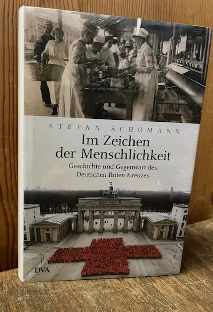 Im Zeichen der Menschlichkeit, Schomann